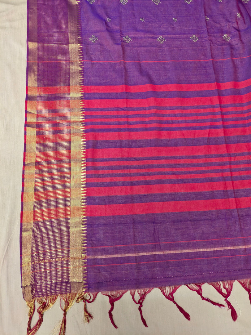Hakki kasuti threadwork detail on magenta cotton saree fabric
