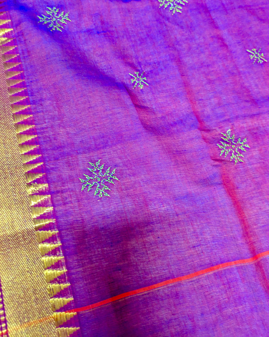 Close-up of magenta hakki kasuti cotton saree with embroidered bird design