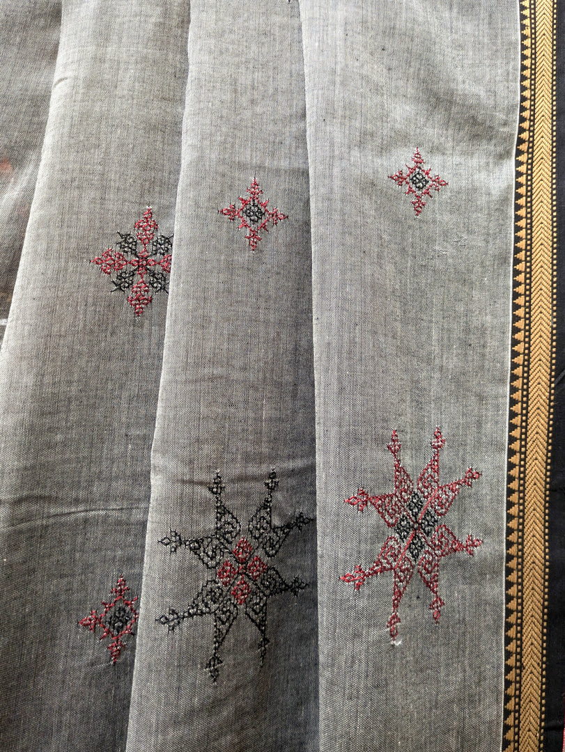 Close-up of chutney green mayur cotton saree with bird embroidery