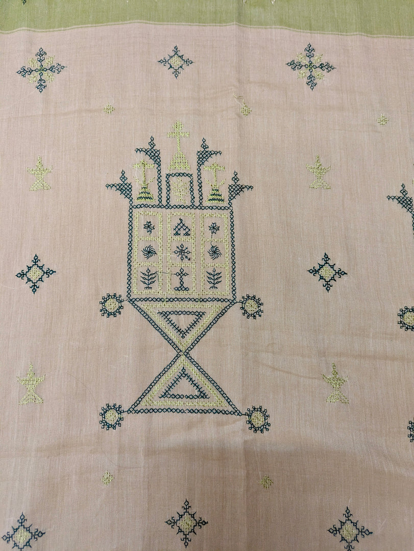 Close-up of pickle green kasuti ter handwoven cotton saree design