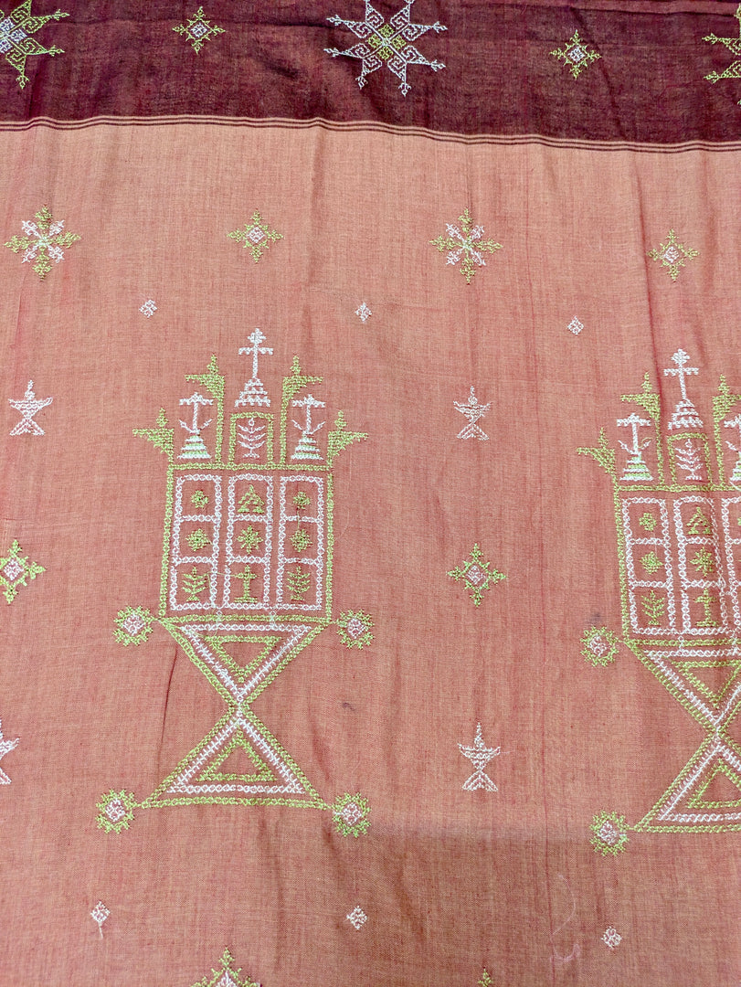 Pallu view of maroon handwoven cotton saree with kasuti ter embroidery