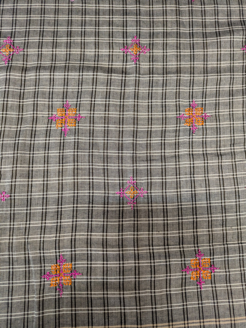 Embroidery close-up on grey cotton saree with malini kasuti threadwork