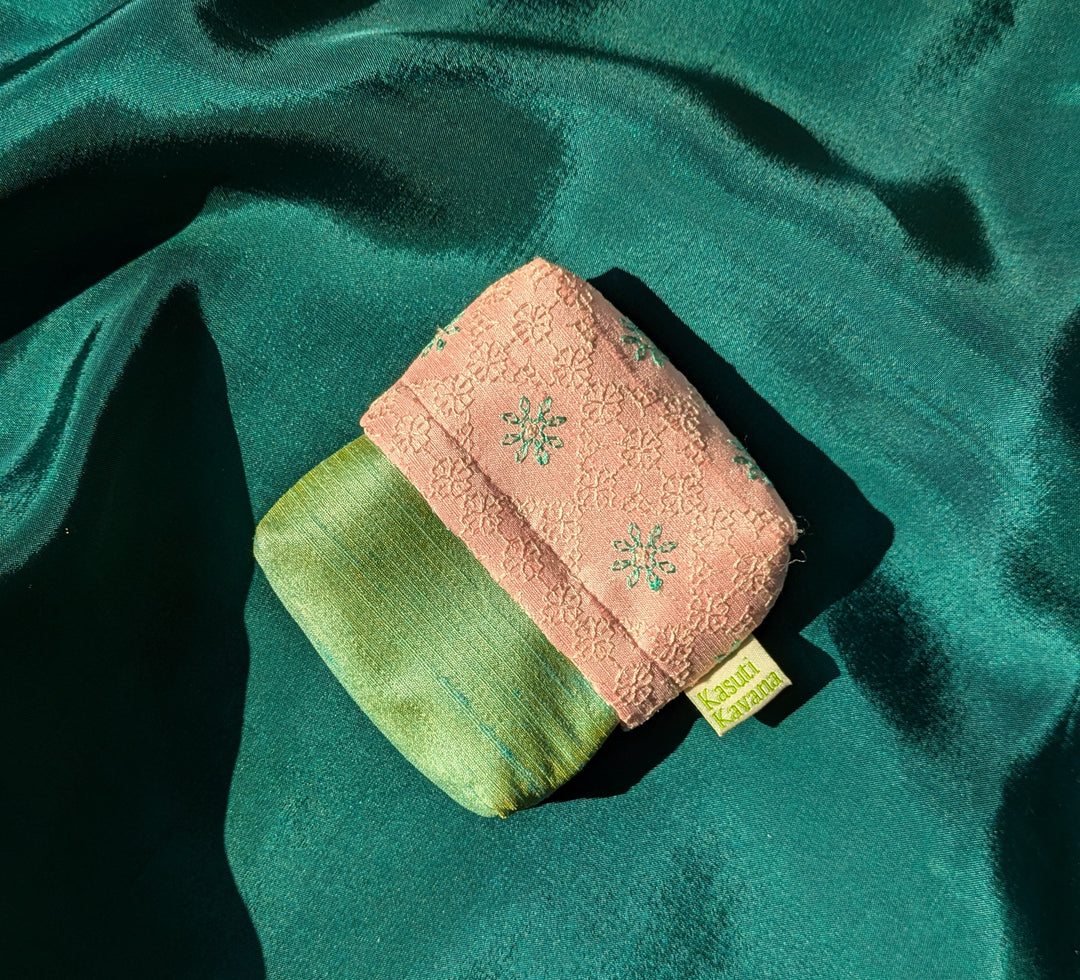 yamuna ganga jamuna purse in striped fabric with textured weave