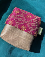 Load image into Gallery viewer, narmada ganga jamuna purse showing striped weave and stitched detailing
