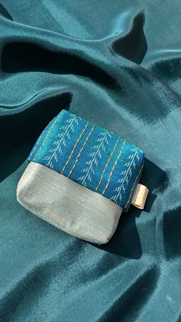 krishna ganga jamuna purse showing textured weave and stitched surface