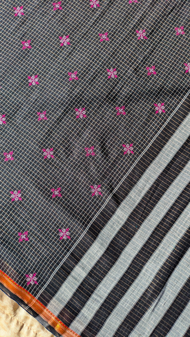 black handwoven cotton saree with malini kasuti embroidery close-up