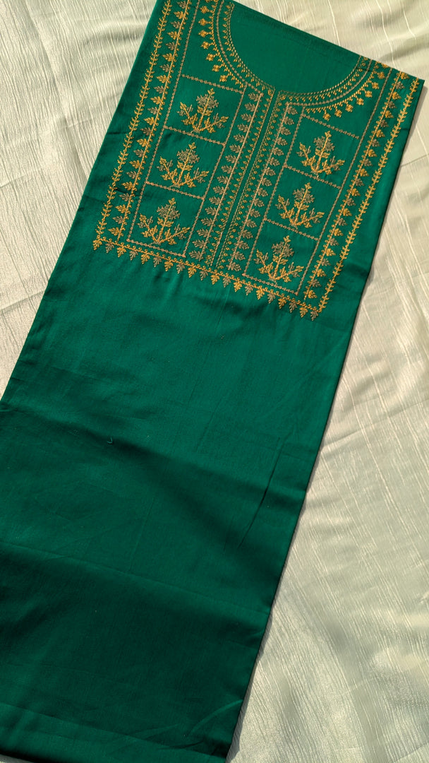 Folded view of green tulsi checks kurta material with grid design