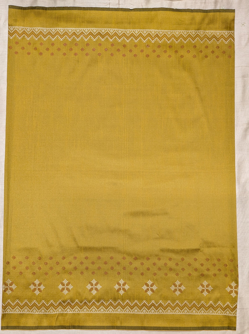 Back hook detail of mustard kasuti blouse with embroidery