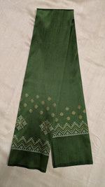 Load image into Gallery viewer, Angled side view of mehendi green blouse with kasuti motifs
