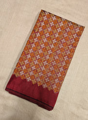 Maroon banjara work blouse close-up showing mirror and thread embroidery