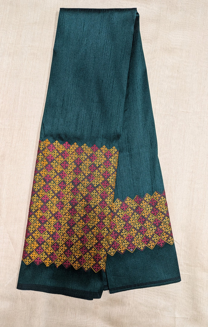 deep green blouse with banjara work embroidery close view