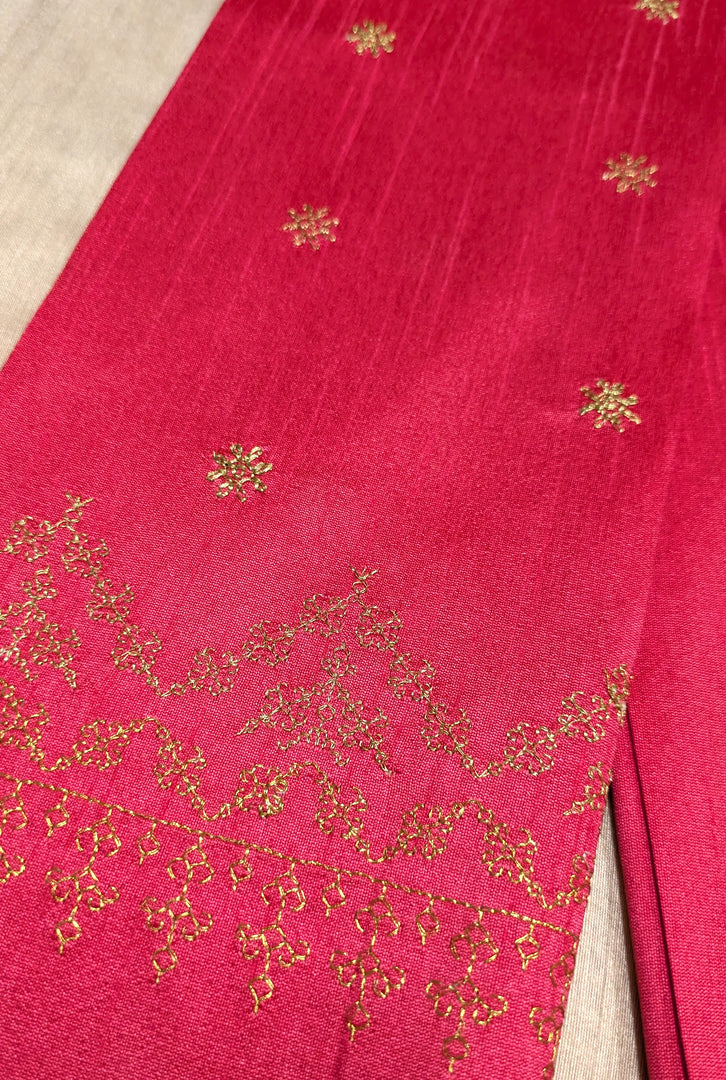Red kasuti blouse front view highlighting embroidered motifs