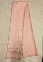 Load image into Gallery viewer, Angled view of peach kasuti blouse showing embroidered motifs on fabric
