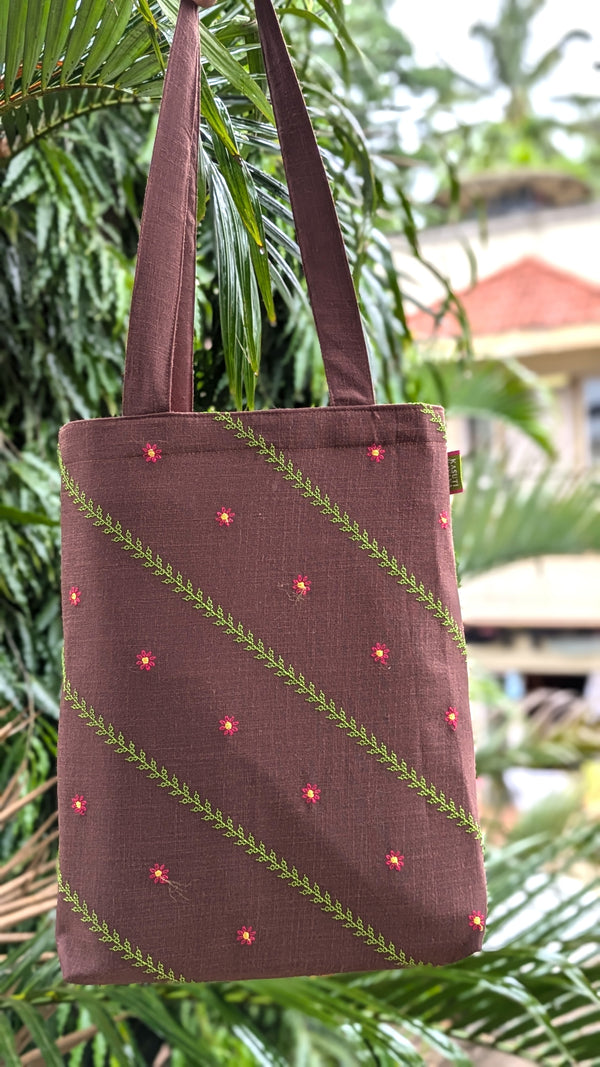 Brown kasuti sitara tote bag with embroidered motif front view