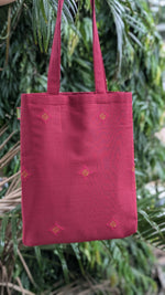 Load image into Gallery viewer, Red kasuti sitara tote bag with embroidered motifs front view
