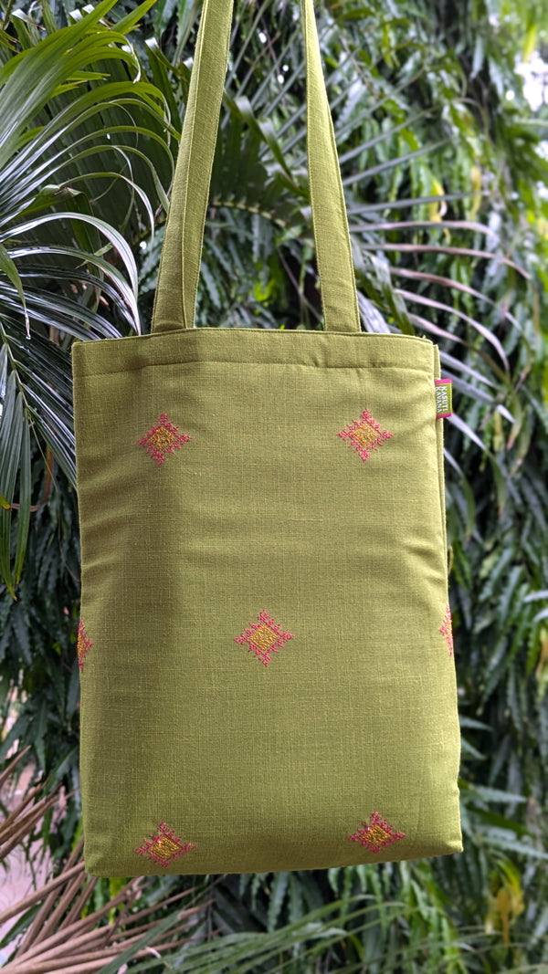 Parrot kasuti sitara tote bag side angle showing embroidery detail