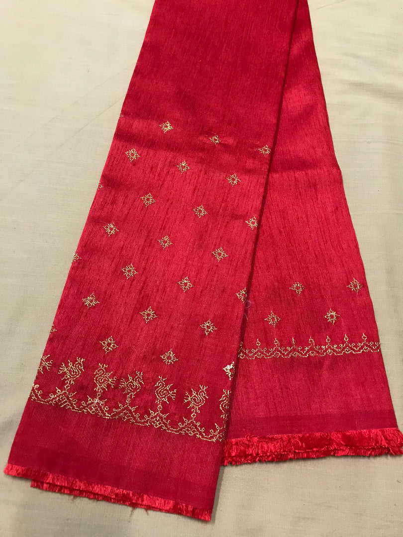 Red peacock kasuti blouse embroidery close-up showing peacock motif