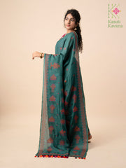 Embroidery close-up of deep green classic kasuti saree