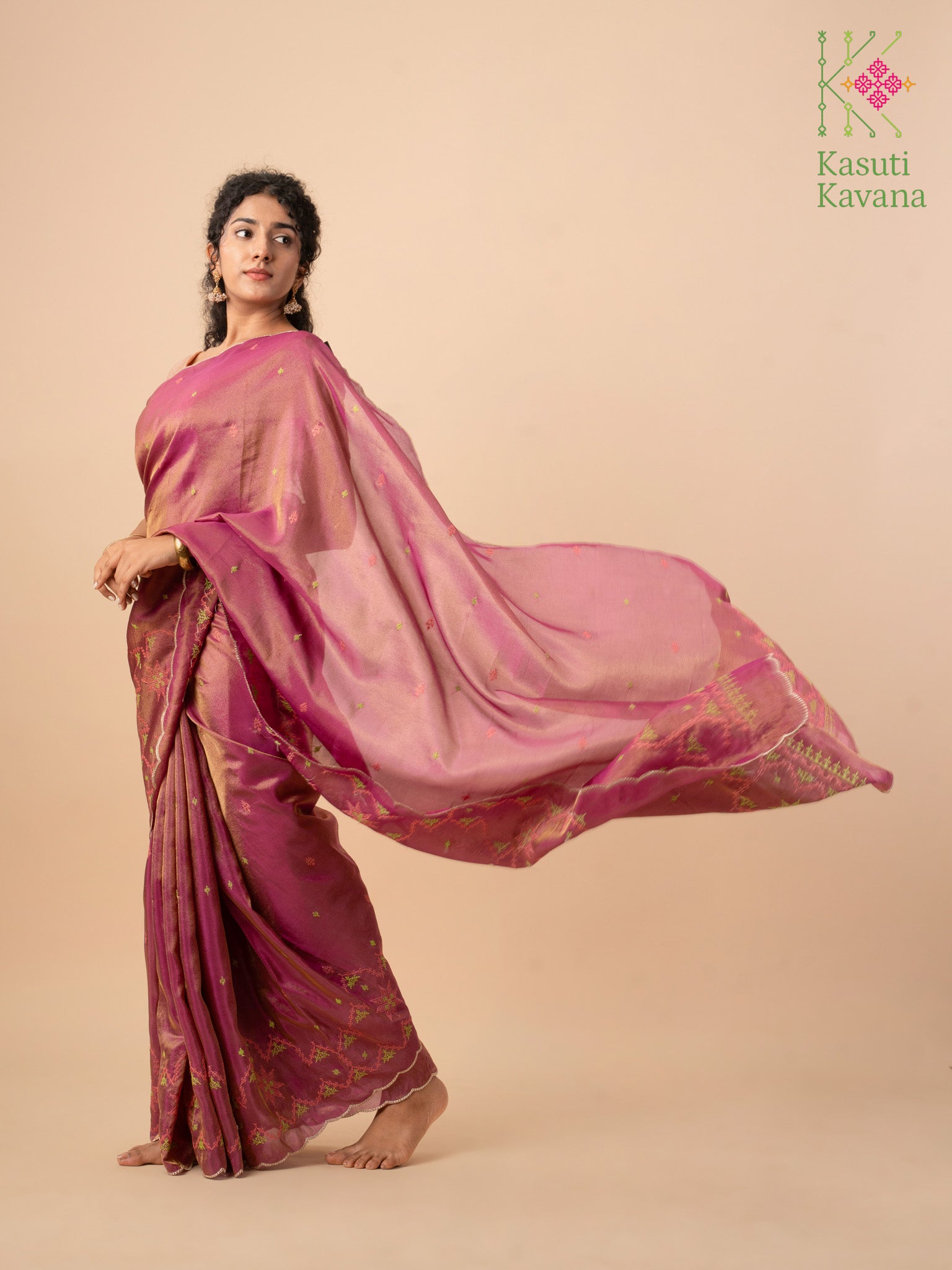 Deep pink kasuti temple tissue saree with golden zari border