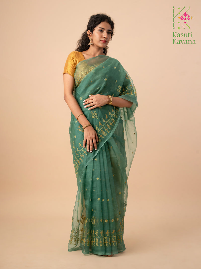 green mayur organza kasuti saree showing embroidered peacock motifs