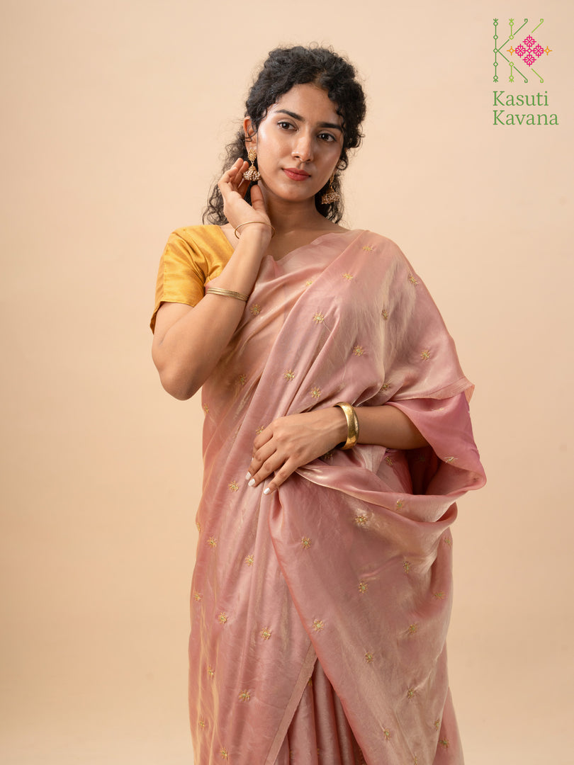 deep brick organza saree showing floral embroidery on sheer drape
