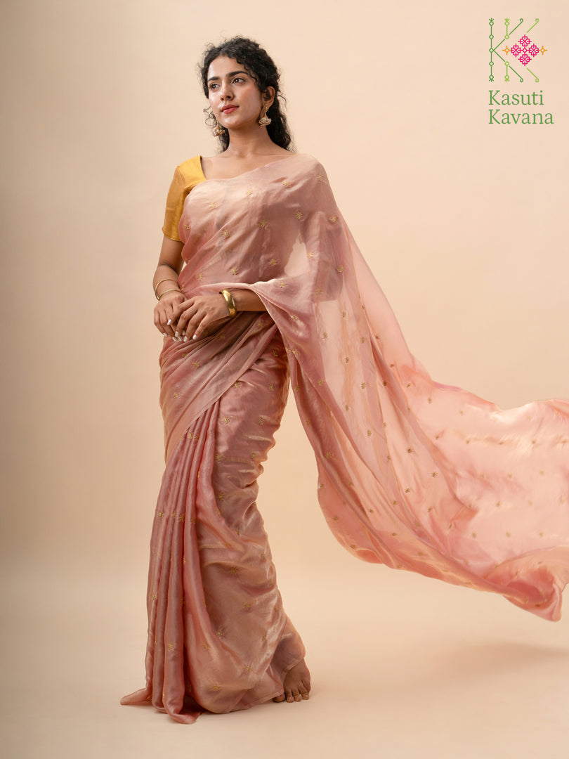 deep brick organza saree highlighting embroidered floral detailing