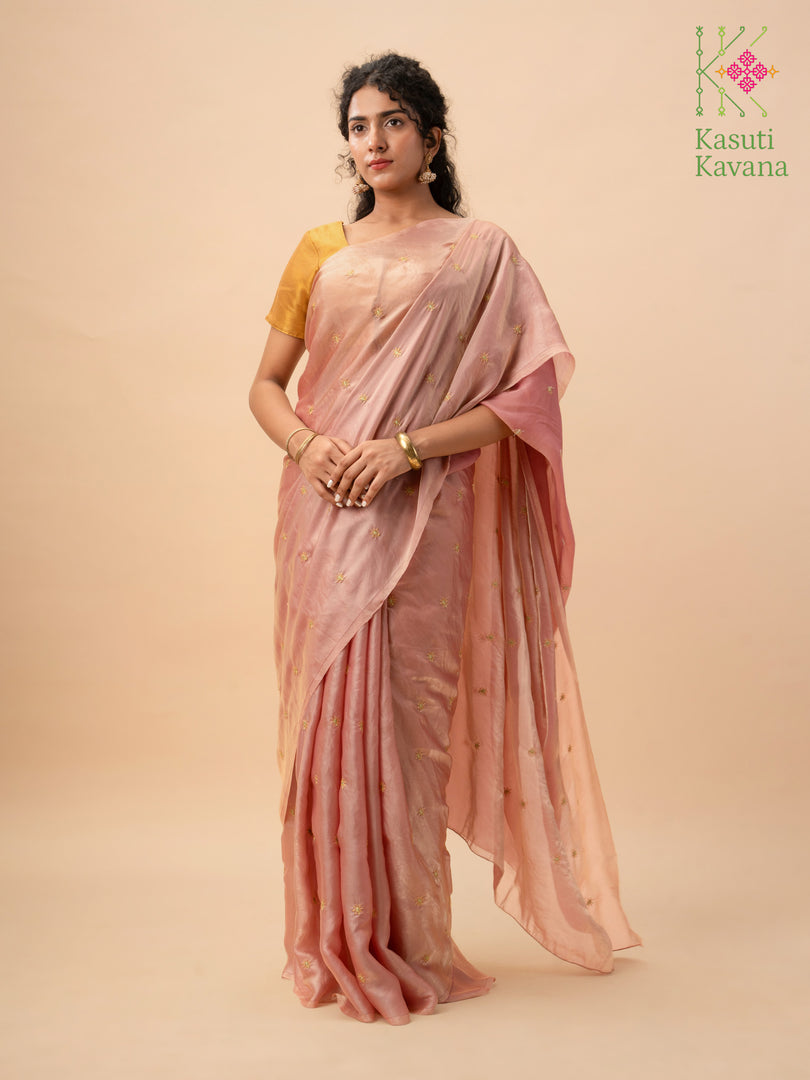 deep brick flora glass organza saree showing floral embroidery close-up