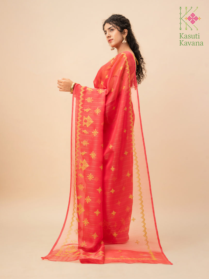 tissue sherbet saree in rani pink with kasuti embroidery pallu detail