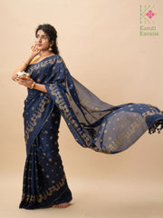 Golden goose motif close-up on navy blue saree