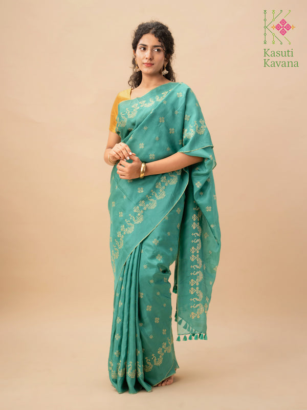 Emerald green golden goose saree with zari border and woven motifs