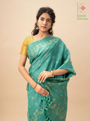 Pallu view of emerald green golden goose saree with golden motifs