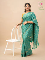 Load image into Gallery viewer, Close-up of emerald green golden goose saree zari weave
