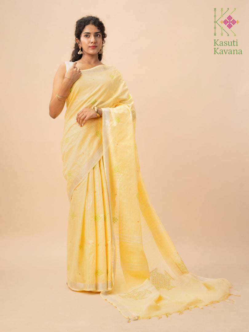 Lemon kasuti saree border close-up with floral cross stitch pattern