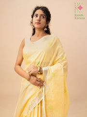 Lemon kasuti saree drape showing floral cross stitch embroidery detail