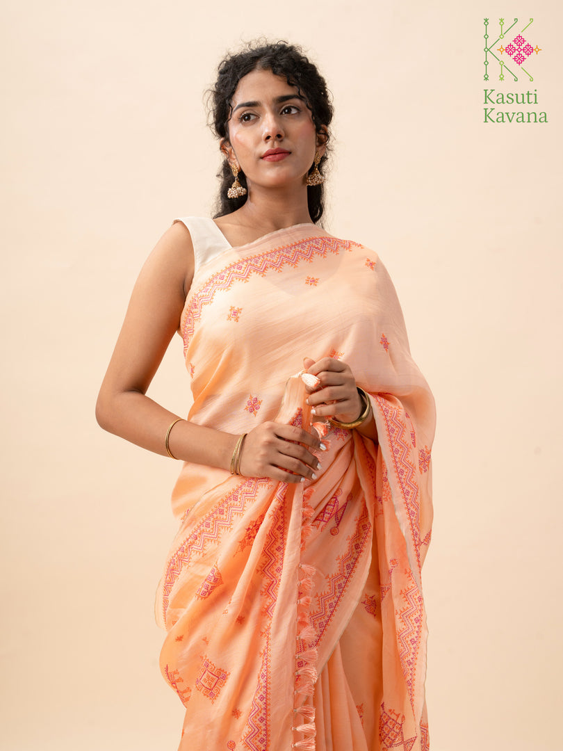 embroidered peach orange kasuti saree pallu detail