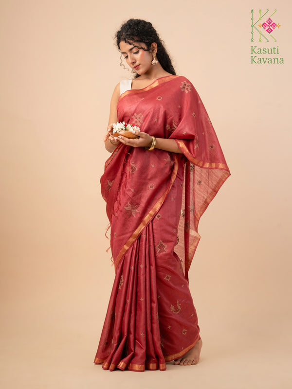 brick red kasuti ooru saree with embroidered motifs on woven fabric