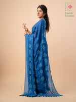 Load image into Gallery viewer, Draped view of blue kasuti saree showing woven motifs
