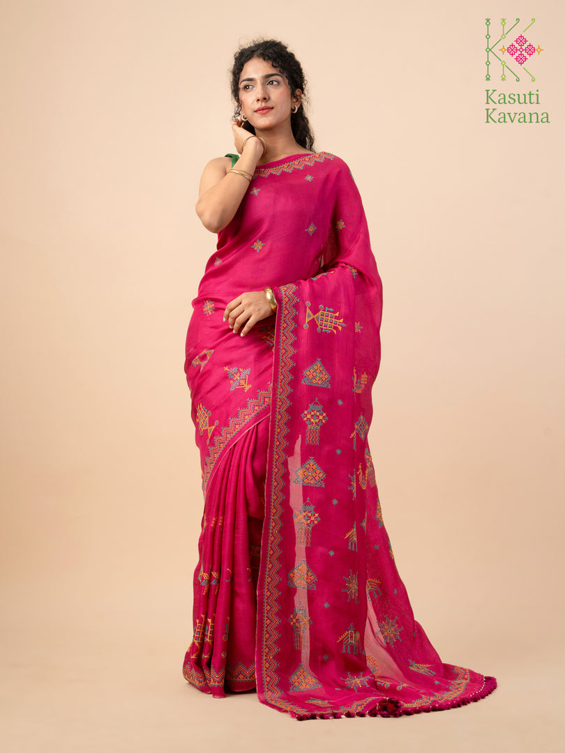 Embroidery close-up on magenta classic kasuti saree