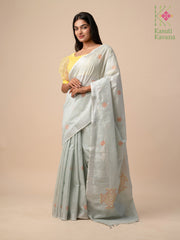 cross stitch embroidery detail on baby pink floret kasuti saree