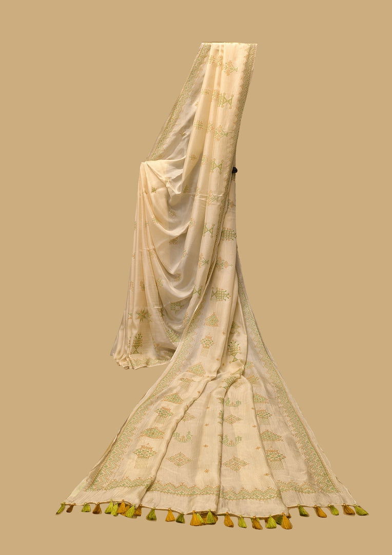 Pearl white kasuti saree with classic embroidery and textured drape