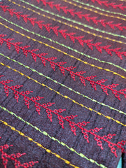 deep maroon kasuti blouse with village motif embroidery front neckline view