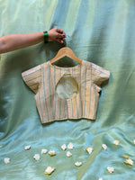 Load image into Gallery viewer, close-up embroidery detail on light pista village kasuti stitched blouse
