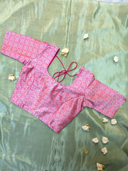 back hook view of pink kasuti stitched blouse with garden embroidery