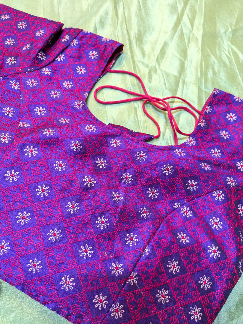 embroidery detail close-up on purple chaya kasuti stitched blouse