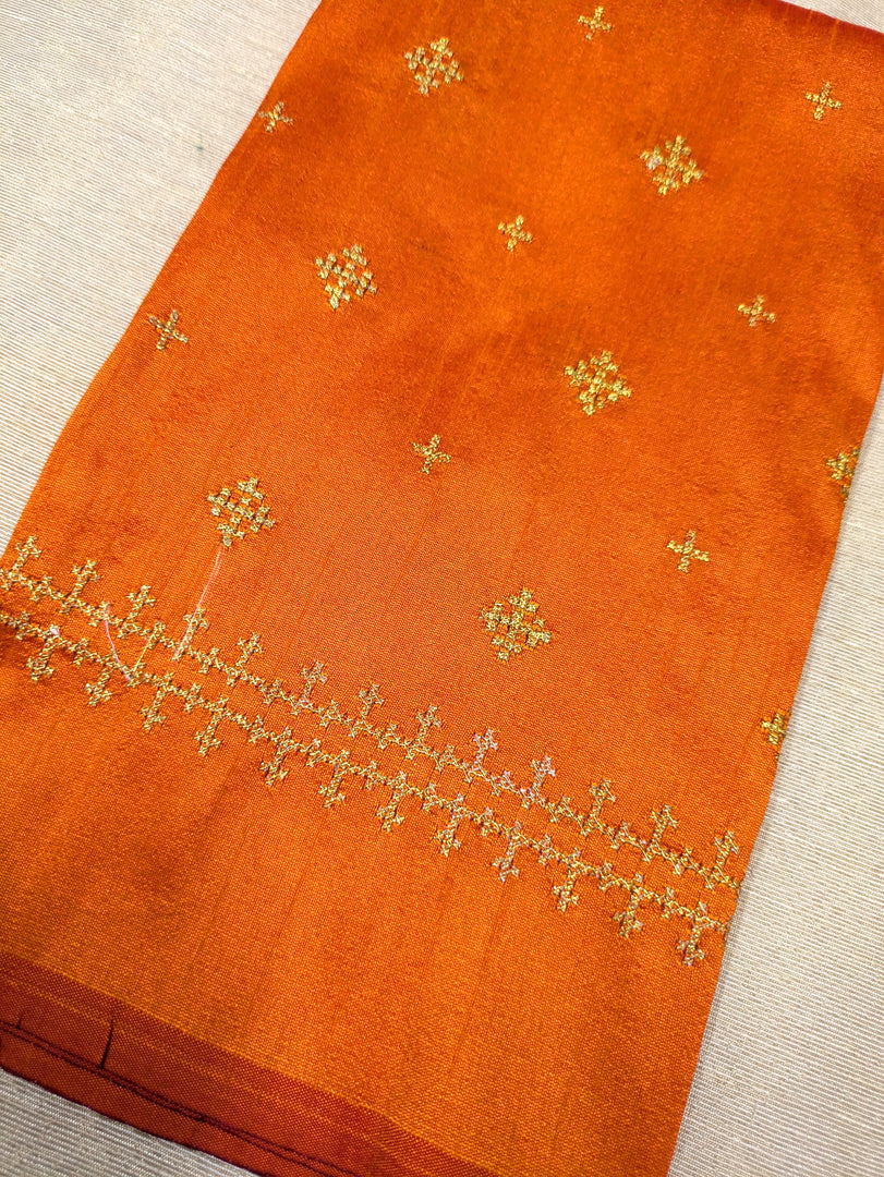 orange kutchwork blouse with diamond embroidery patterns front neckline view