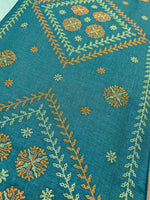Load image into Gallery viewer, green wildflower table runner showing stitched wildflower motif detail
