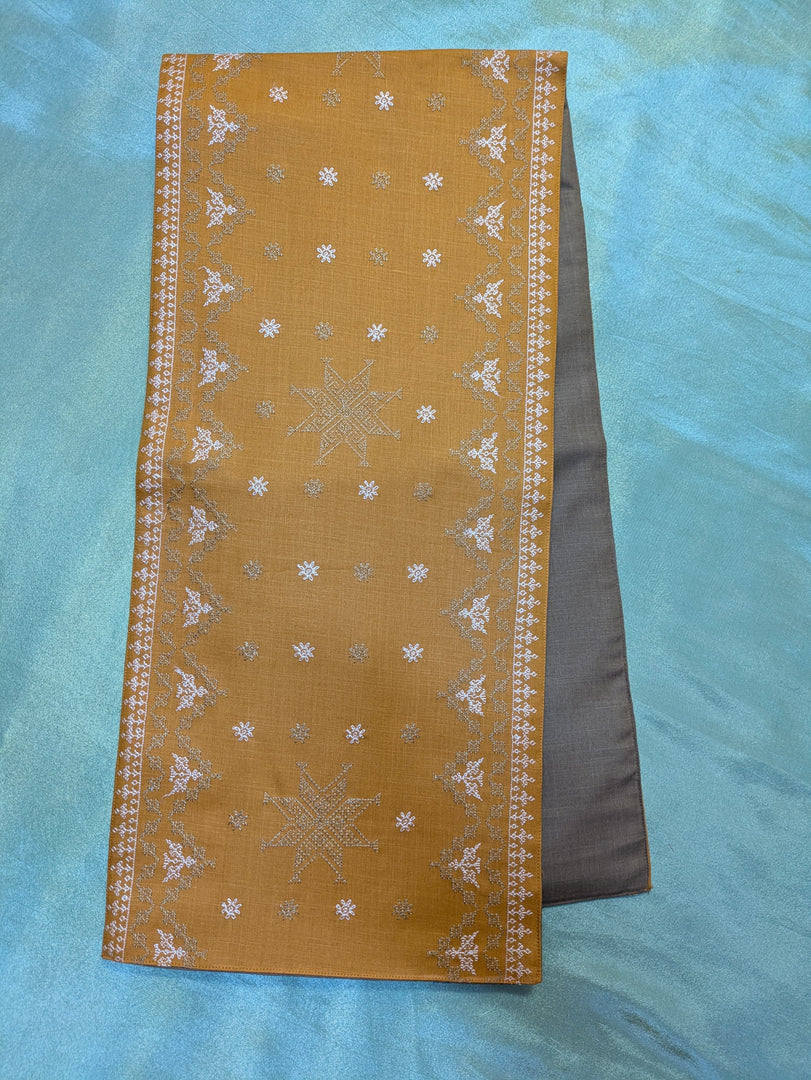 mustard hampi table runner with handwoven texture and border pattern