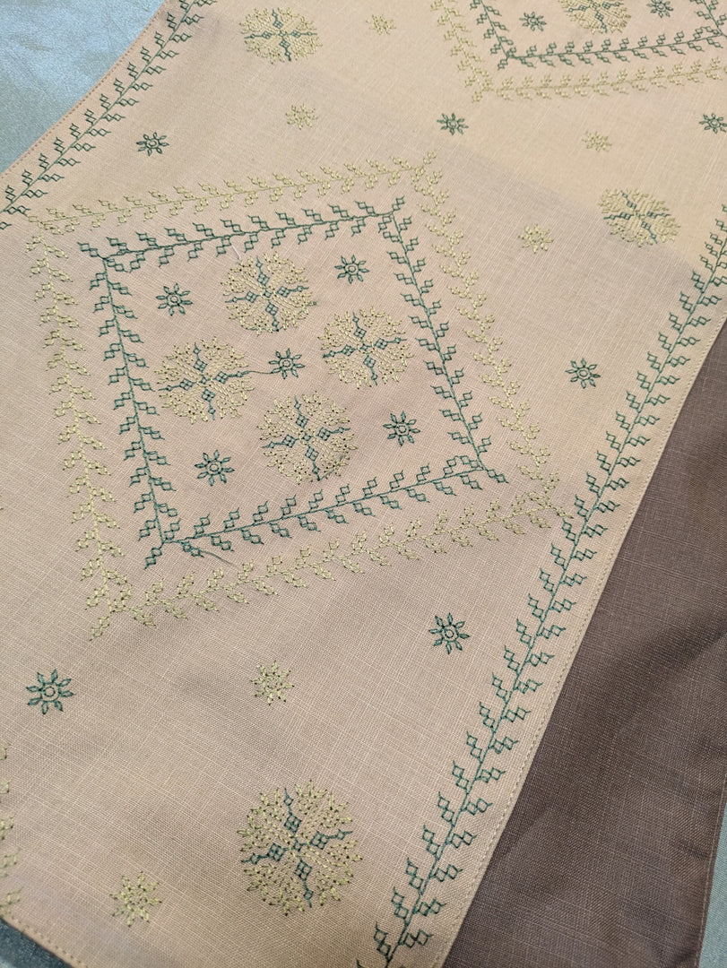 beige hampi table runner with handwoven texture and stitched detailing