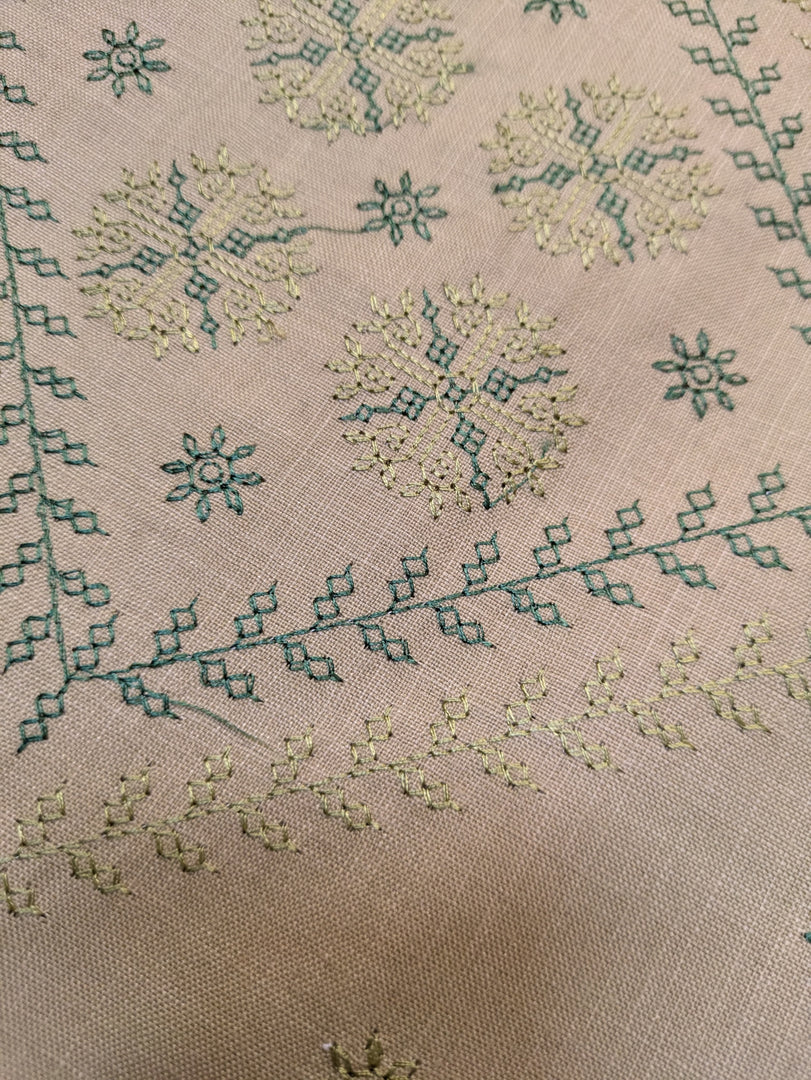 beige hampi table runner highlighting woven surface and border finish