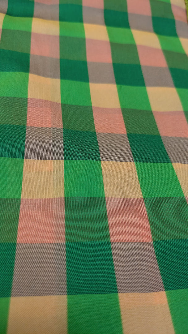 green peach rekha checks combo showing saree weave and blouse fabric